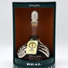 Don Julio Real Extra Anejo Tequila in an elegant glass decanter