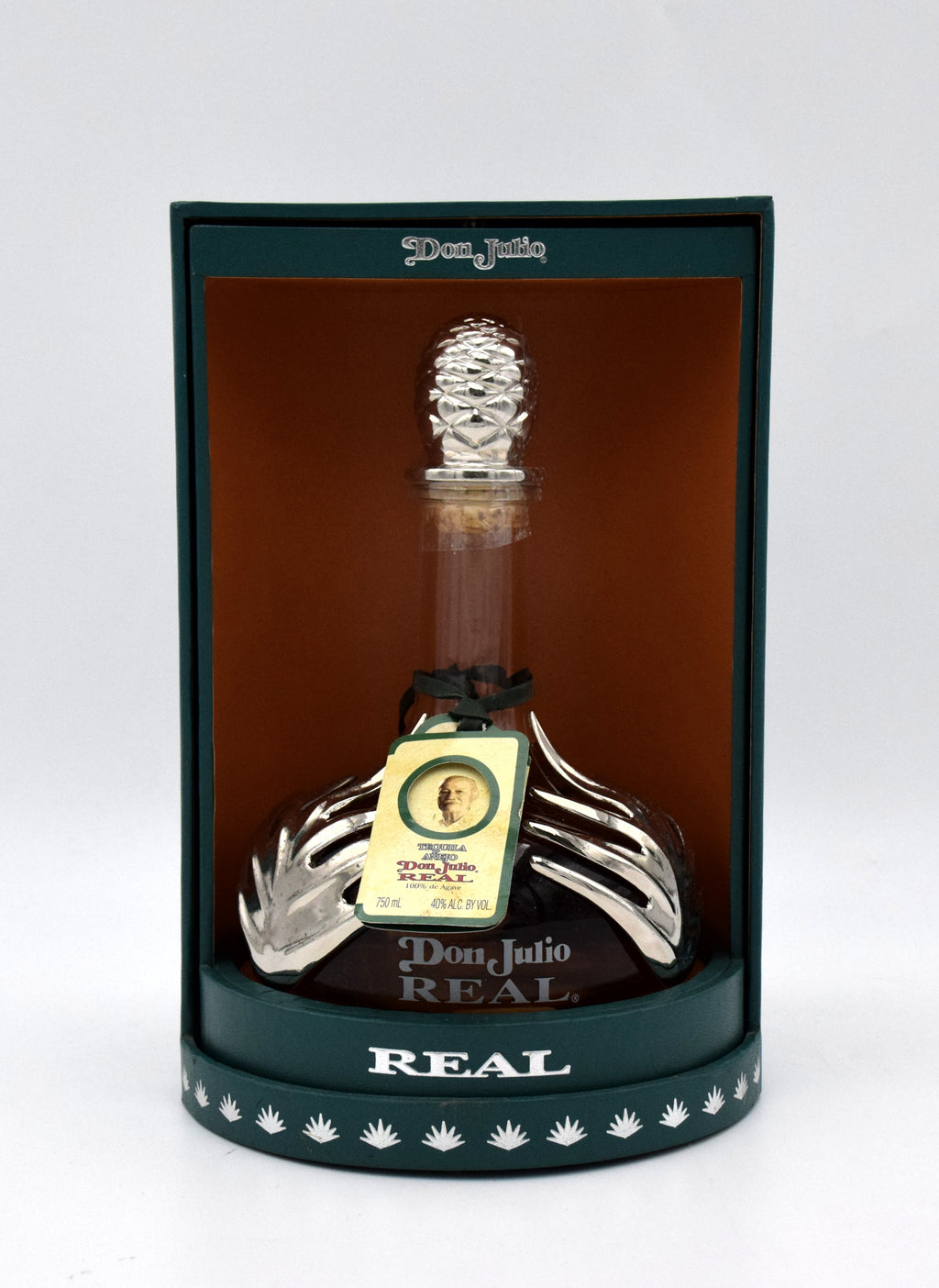 Don Julio Real Extra Anejo Tequila in an elegant glass decanter